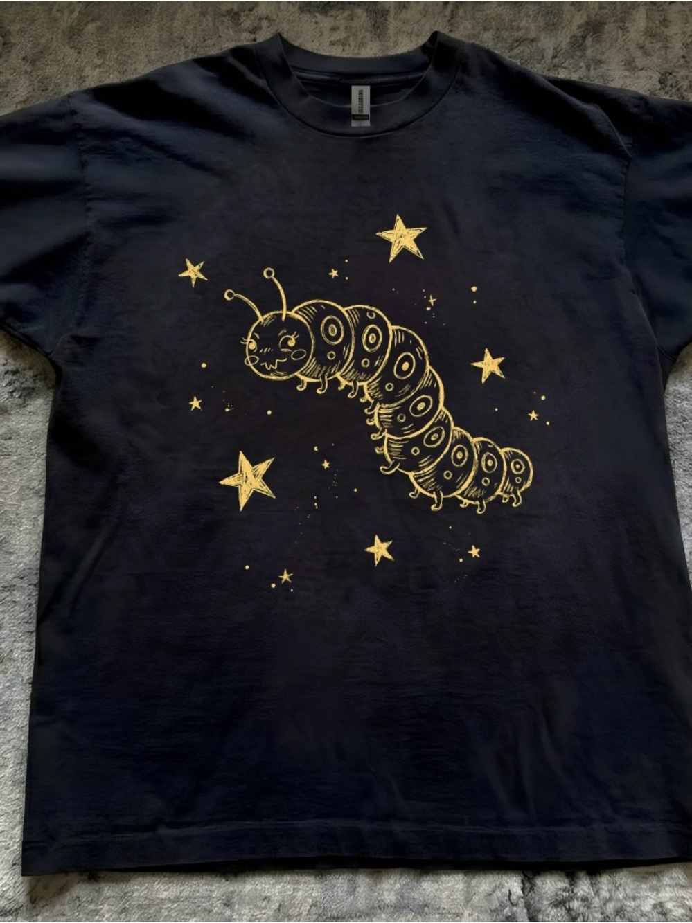 Black T‑Shirt with Gold Grub Star Graphic